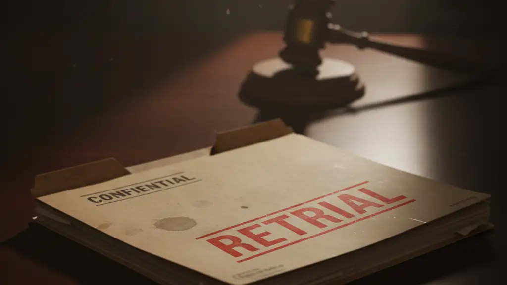 Confidential file folder with 'RETRIAL' stamp on a dark desk, blurred gavel.