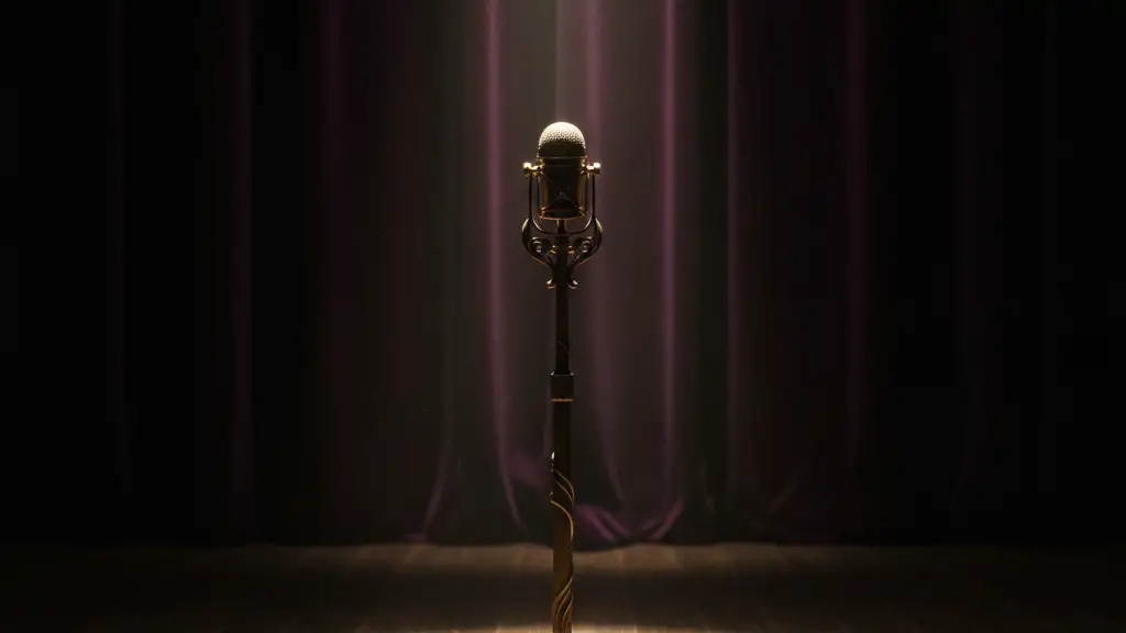An empty microphone stand under a single spotlight on a dark stage.