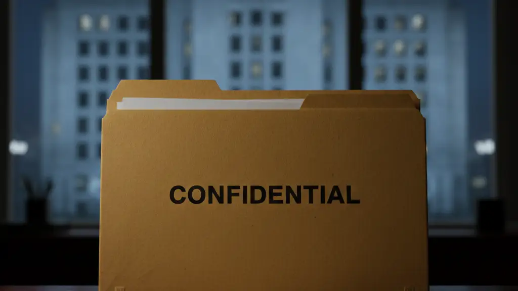 A confidential government file folder sits on a dark desk in a moody office.