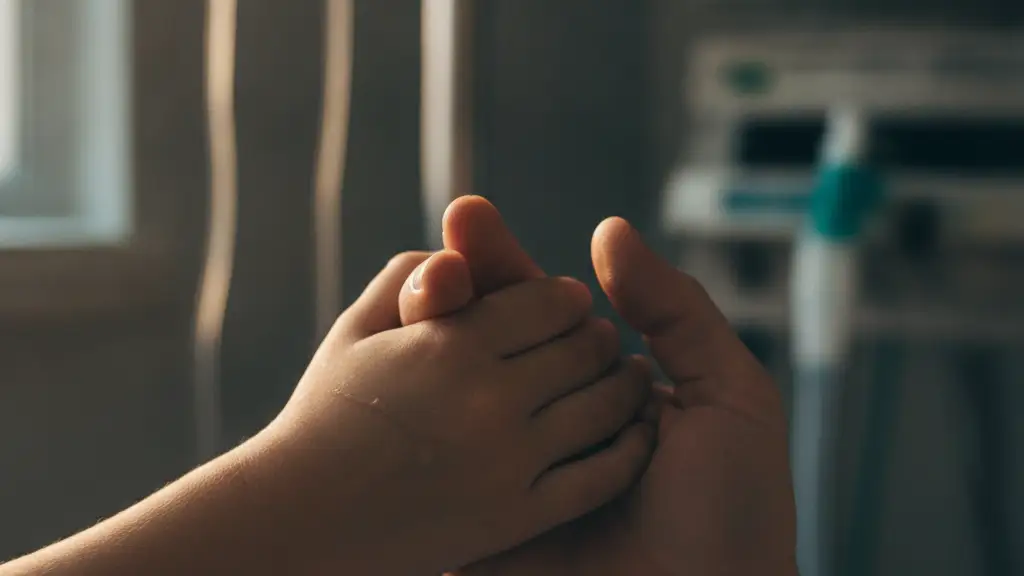 Two small hands gently clasped, symbolizing a medical milestone.