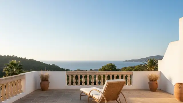 Empty luxury villa balcony in Majorca, Spain, overlooking the Mediterranean Sea.