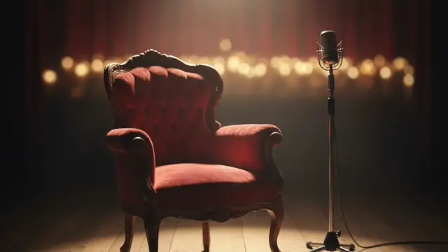 An empty, elegant armchair under a single spotlight, with a vintage microphone stand.