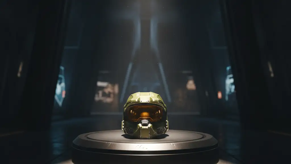 A lone Master Chief helmet on a pedestal in a dimly lit, futuristic setting.